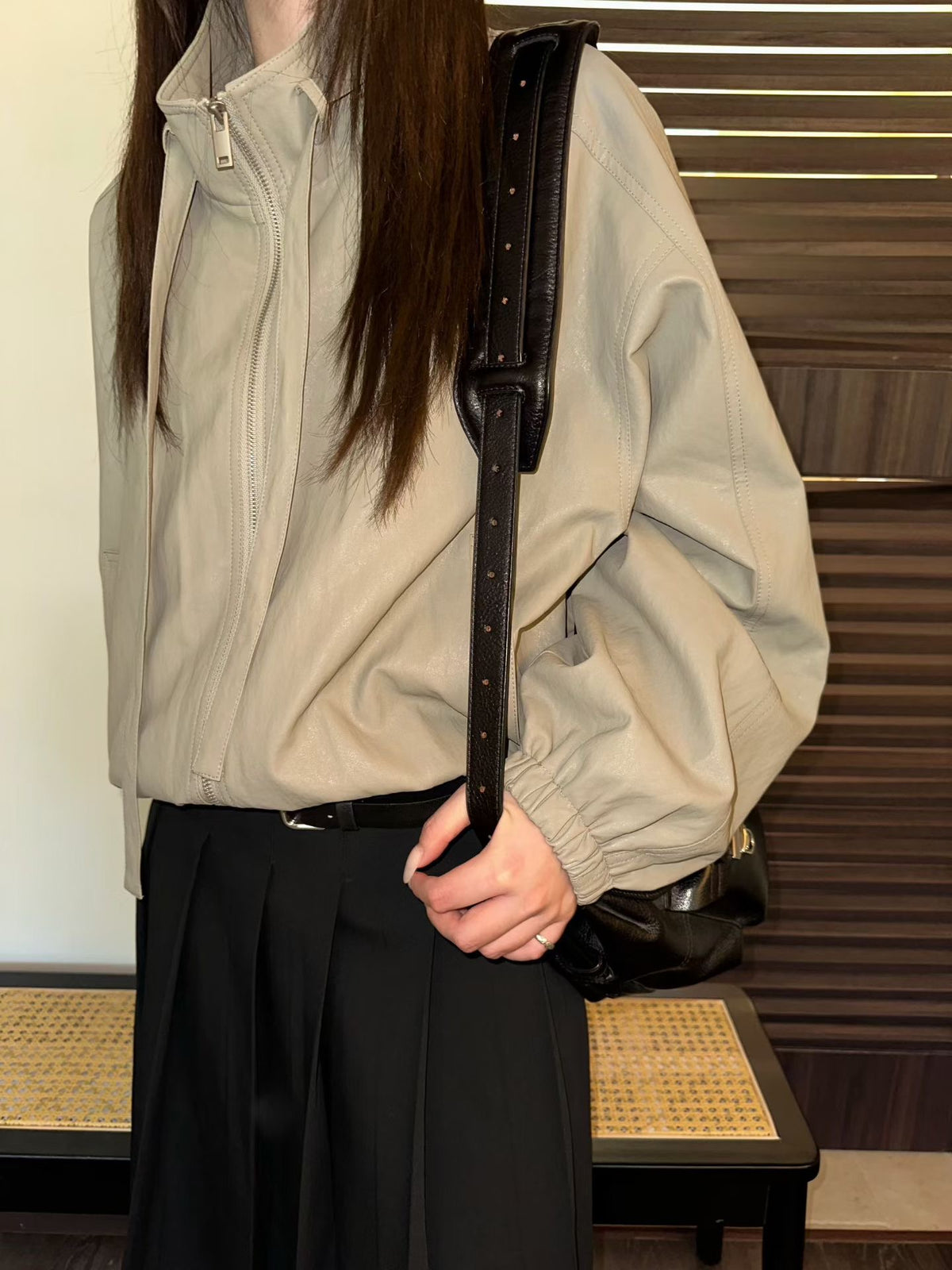 Belted faux leather jacket