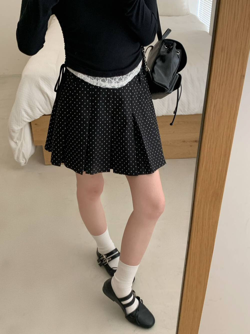 Dot-patterned pleated skirt pants