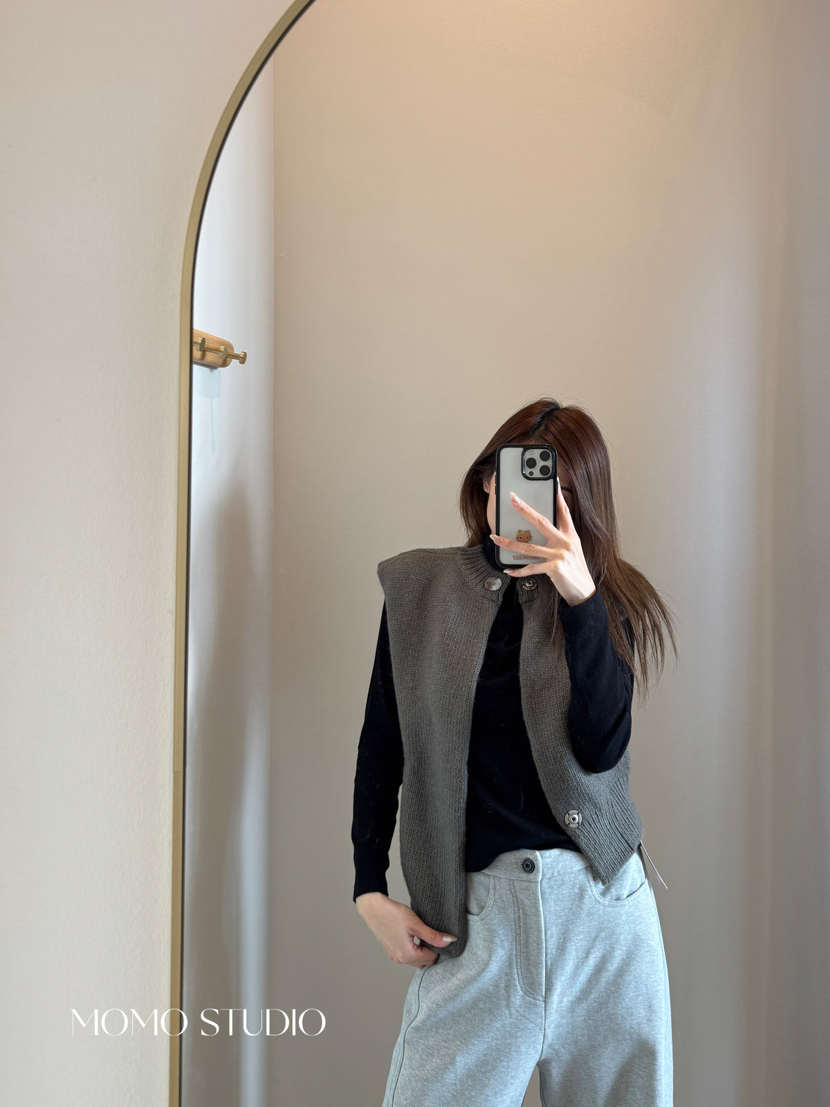 Button asymmetry vest