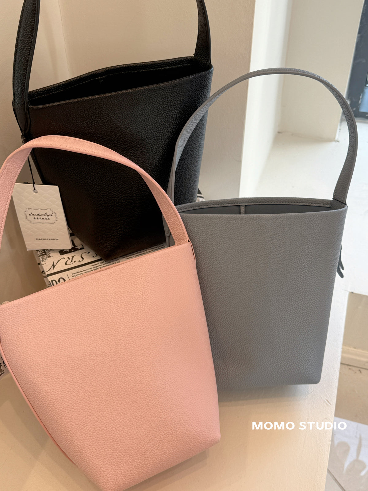 Handheld bucket bag (cowhide)