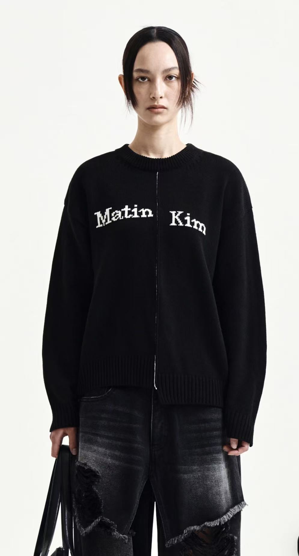 Matin Kim ASYMMETRIC LOGO KNIT PULLOVER IN BLACK