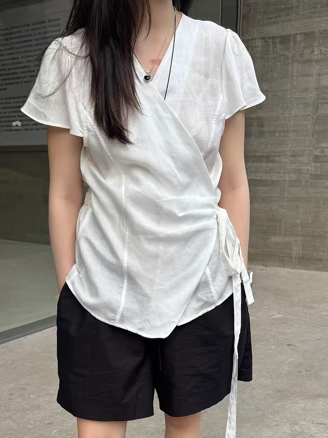 Cotton and linen side-tie top
