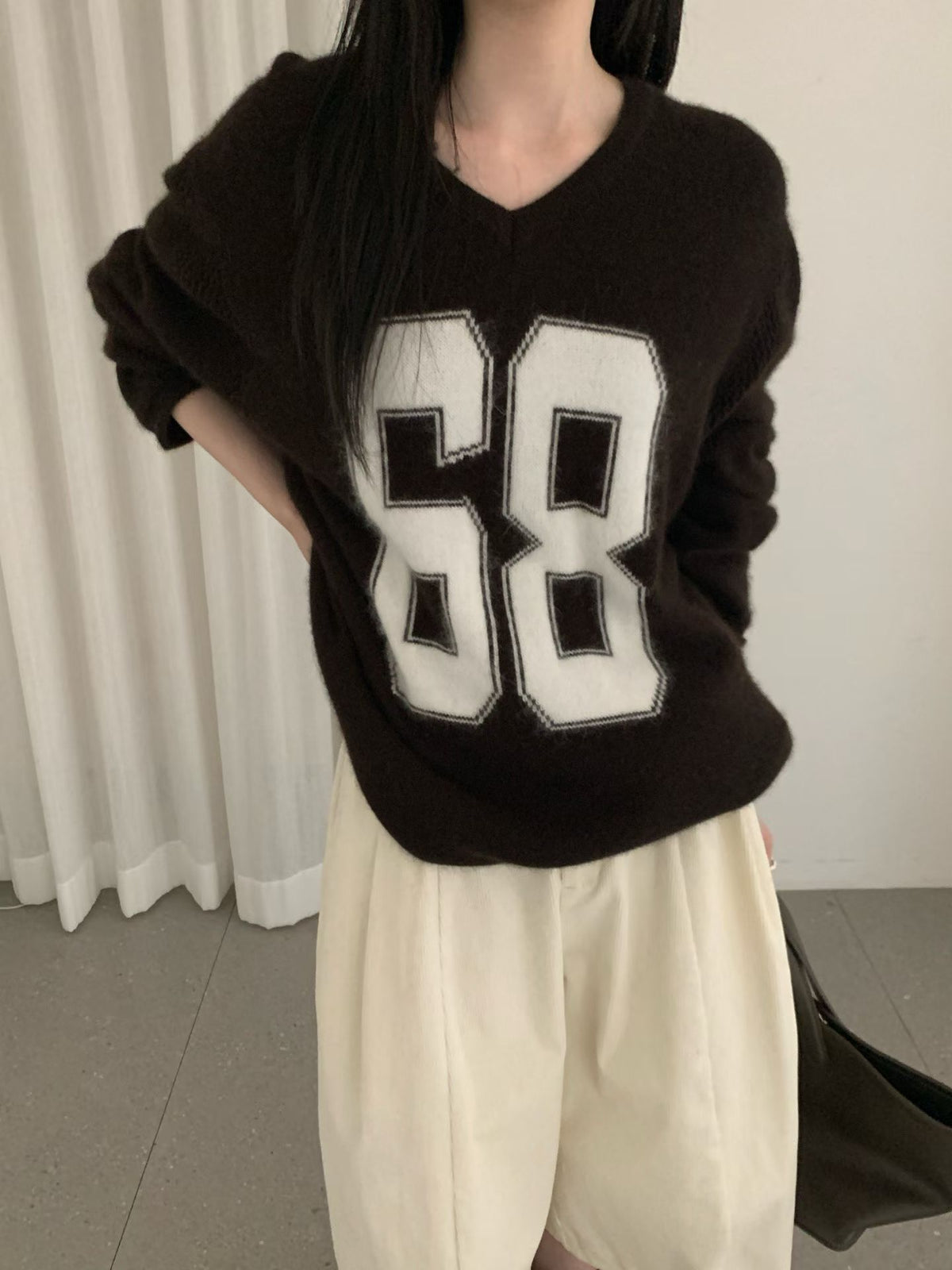 Number V-neck sweater