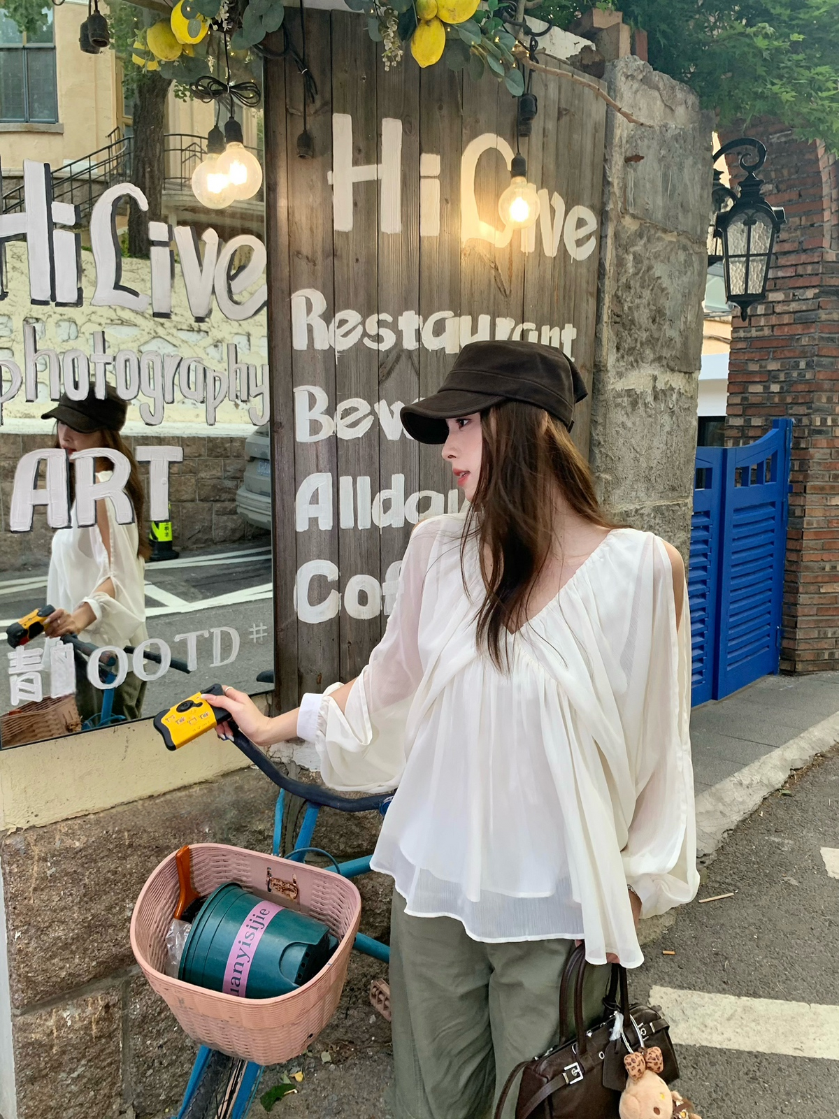 Cutted shoulder V-neck blouse